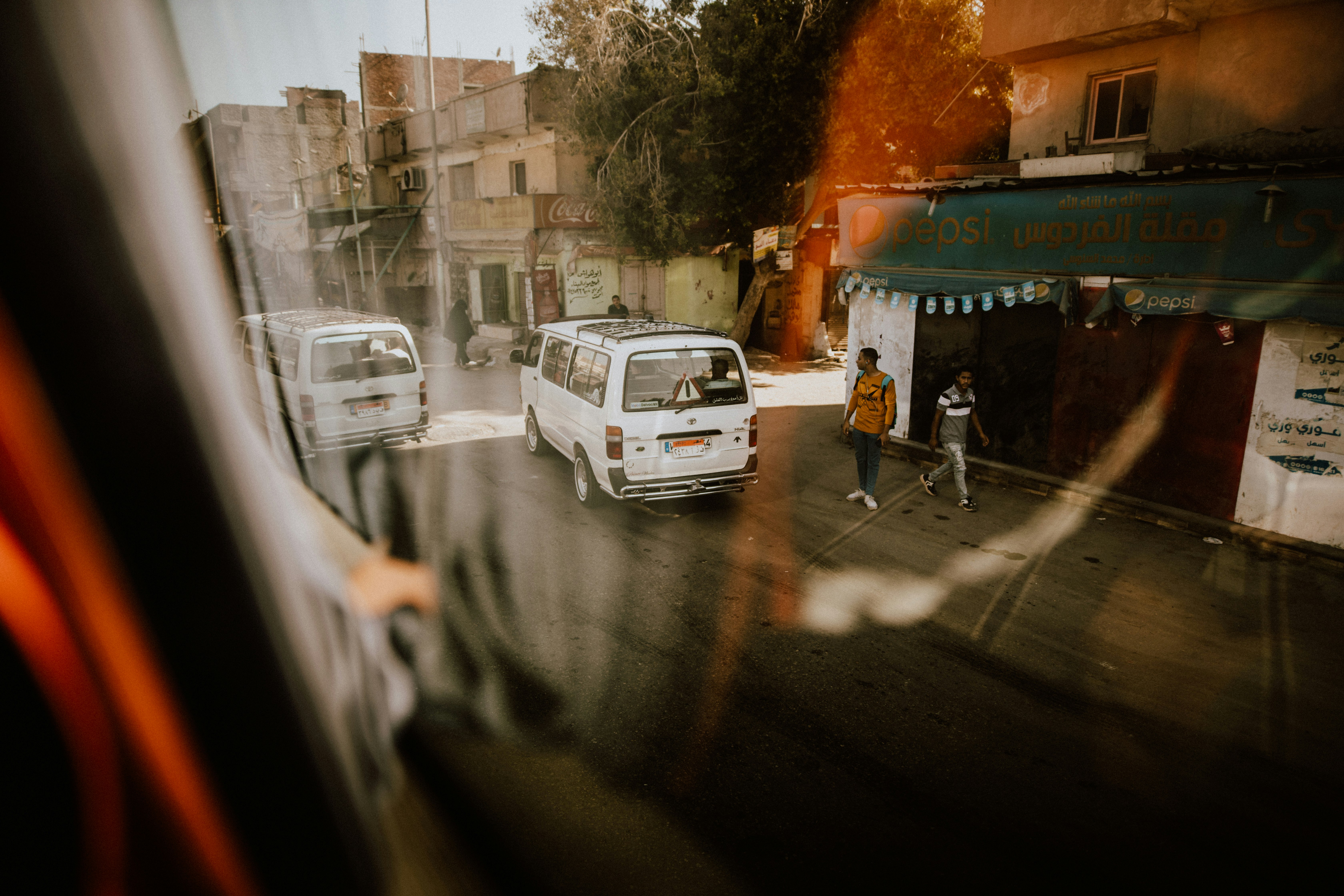 white van on road during daytime